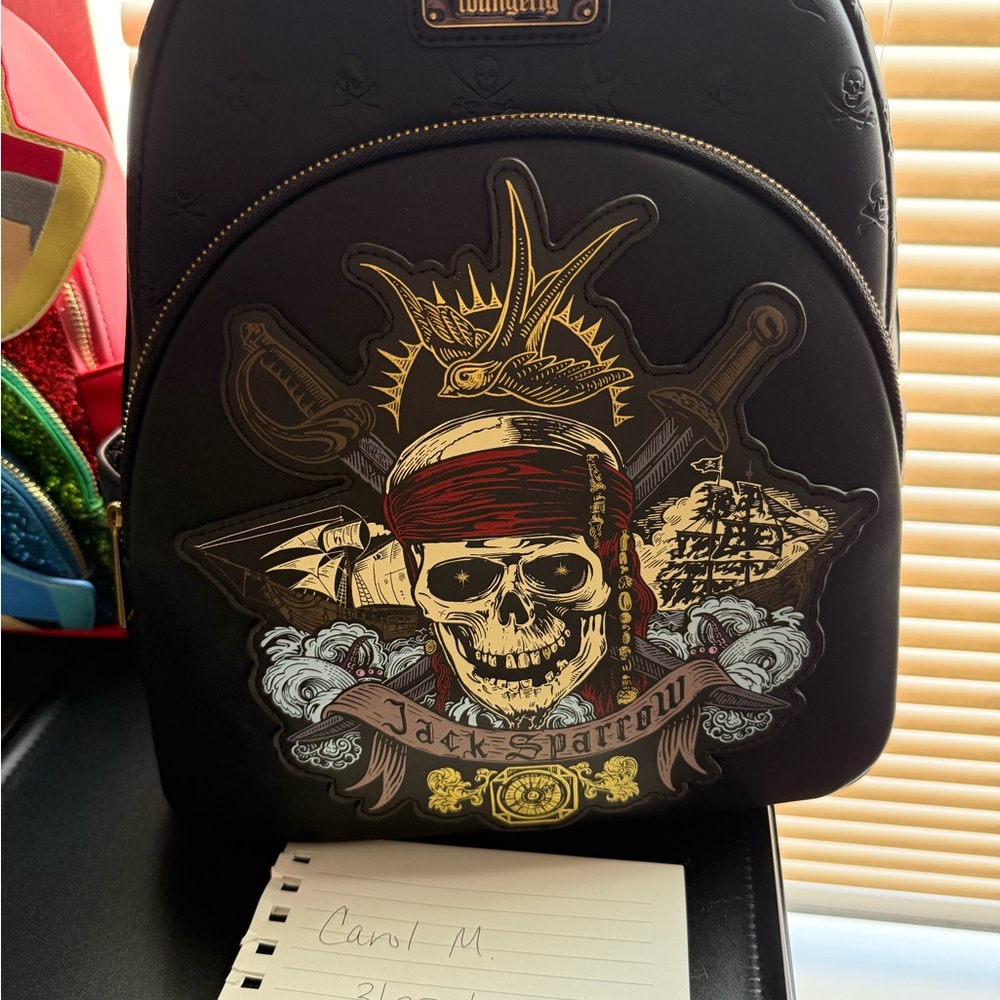 Loungefly Black Jack Sparrow Pirate Skull Mini Backpack with Red & Gold Accents